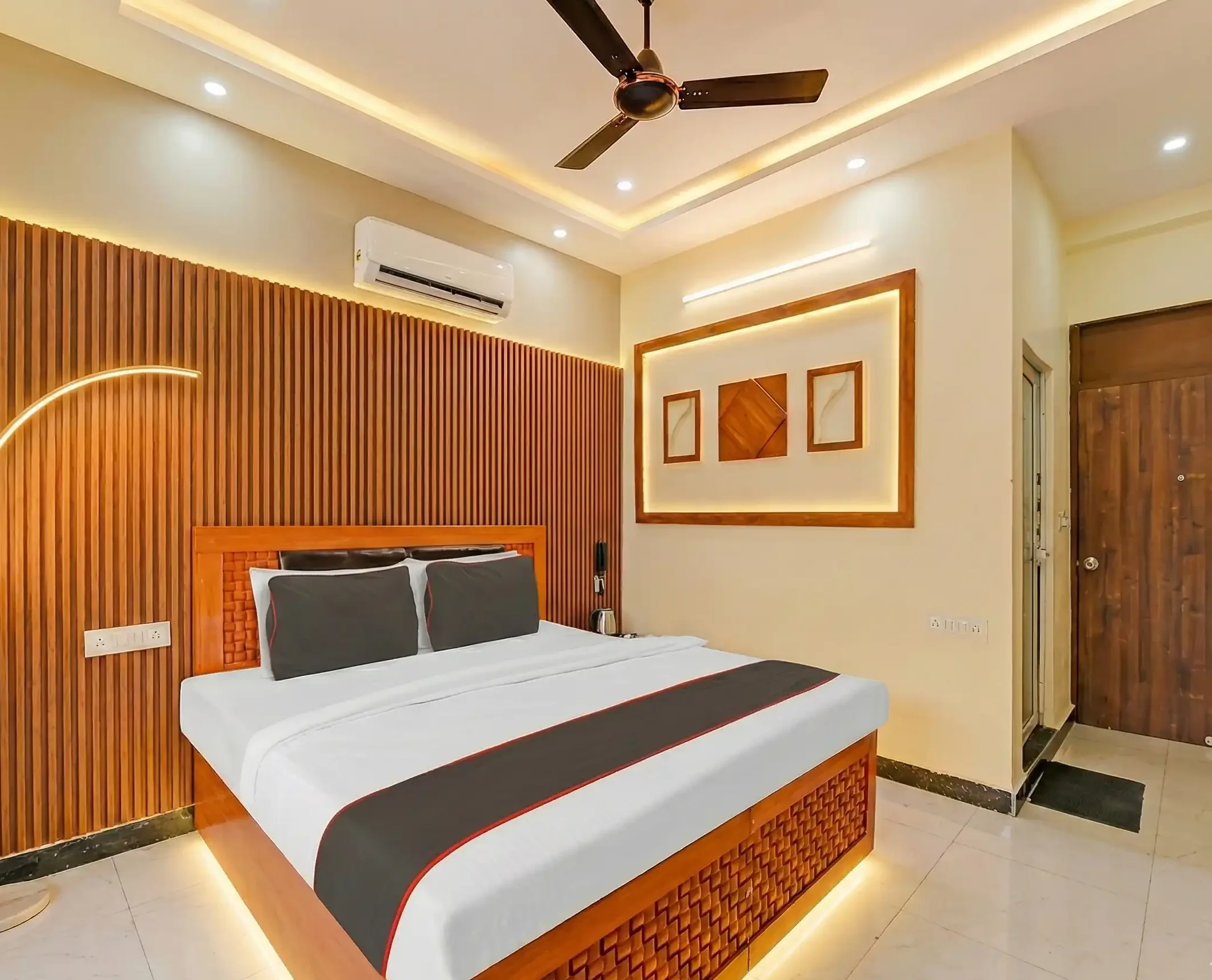 Cozy Deluxe Room with King Size bed and AC at Hotel Imperial Palace near Jal Mahal.