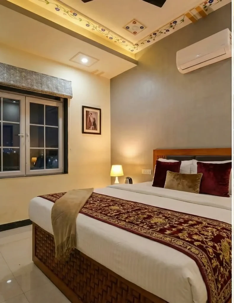 Spacious Deluxe Bedroom at near amer & hawa mahal at Hotel Imperial Palace jaipur with King Size Bed and AC.